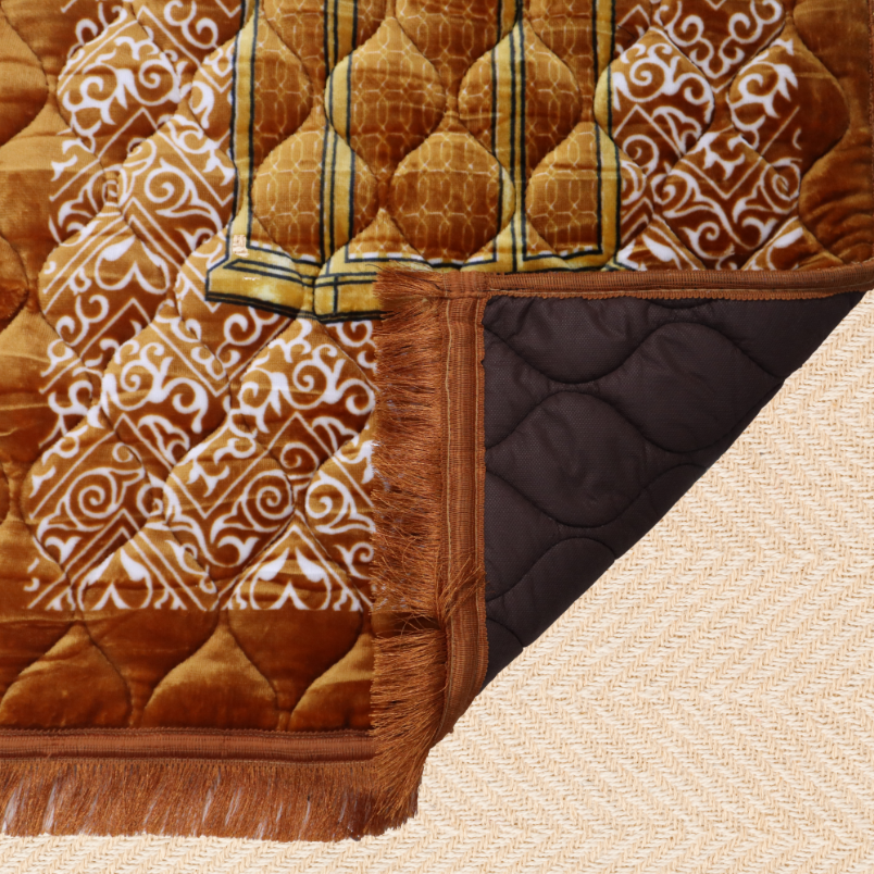 Close-up of a textured brown fabric with geometric patterns on a beige surface