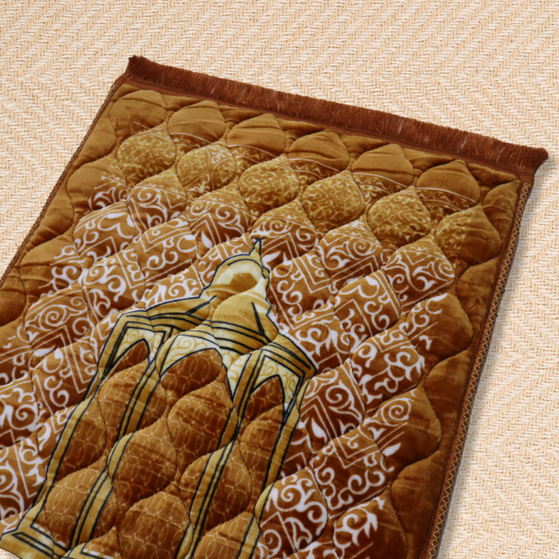 Decorative quilt with intricate patterns on a beige background
