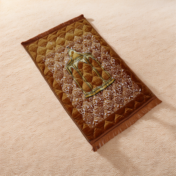 Brown prayer mat with geometric patterns on a beige surface
