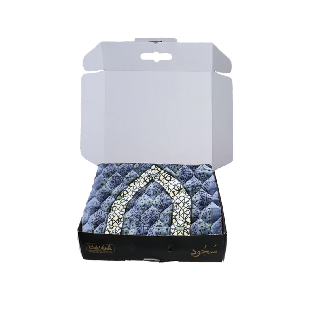Blue textured product with a white pattern in a white box on a white background