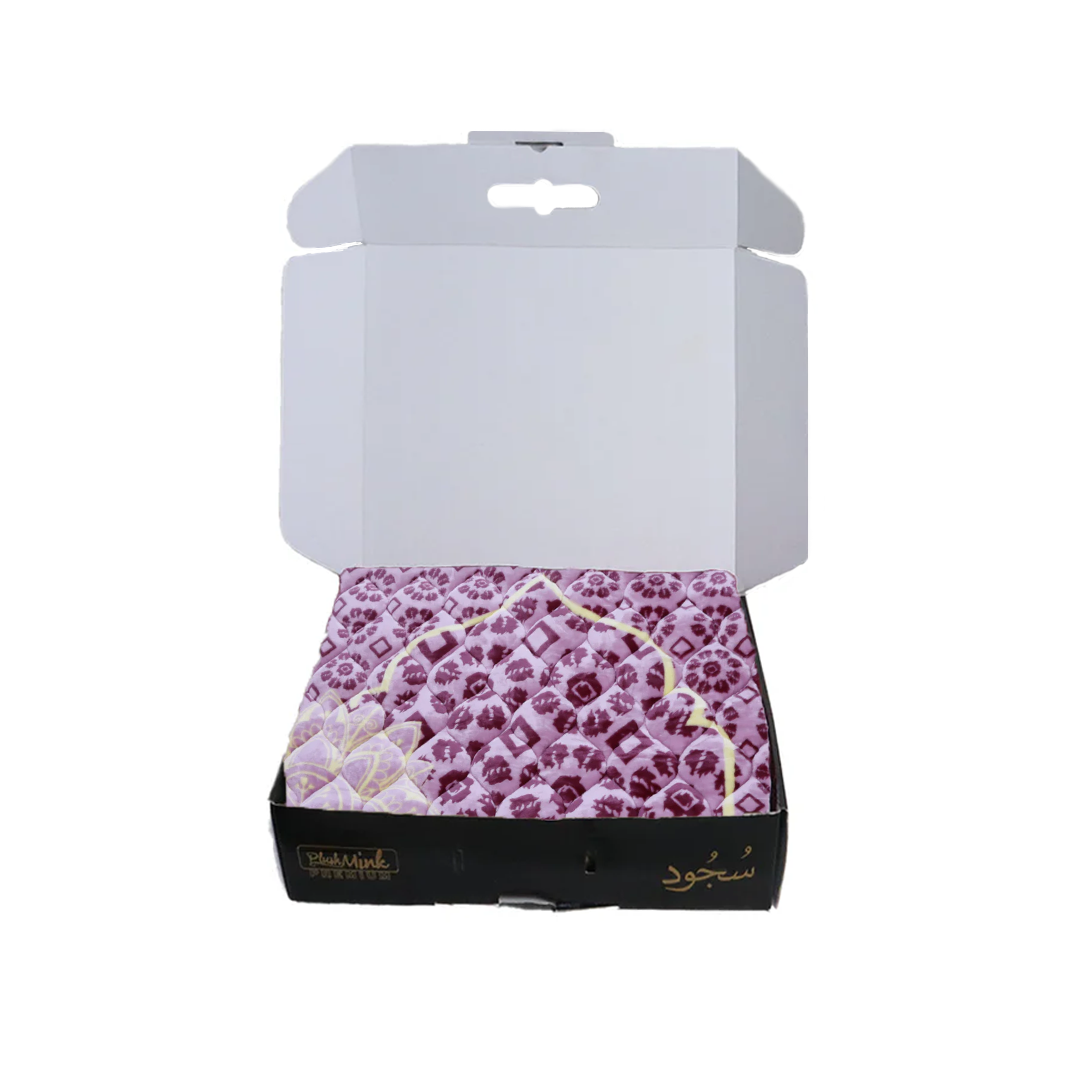 Open box with a purple patterned product inside on a white background perfect for gifting in Pakistan