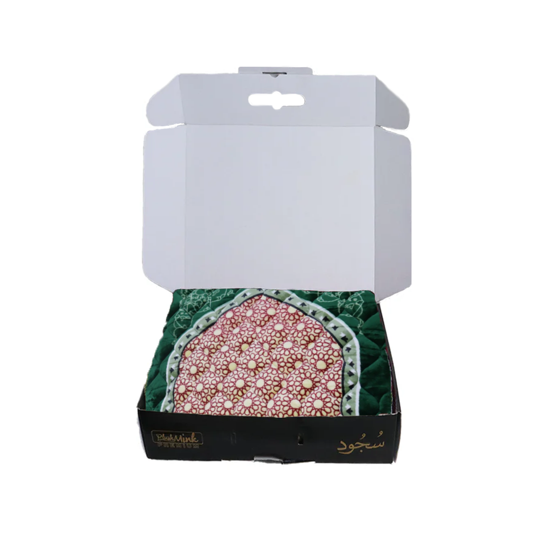 Decorative mat with floral design in a black box on a white background perfect for gifting in Pakistan 
