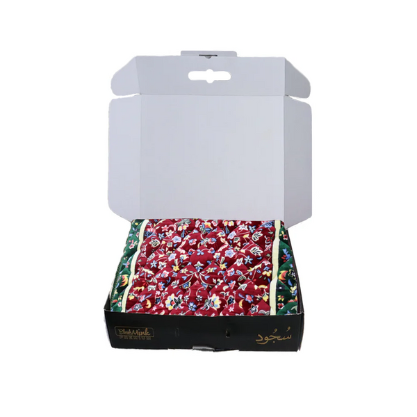 Floral-patterned fabric in a black box with a white background perfect for gifting in Pakistan 